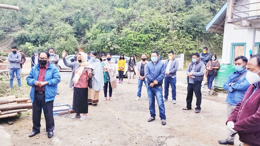 A group of people praying as sensitization and COVID-19 vaccination drive is being done across Zunheboto district.  (Photo Courtesy: twitter@NagalandNhm/ For representational purpose only)